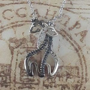 black and silver giraffe necklace
